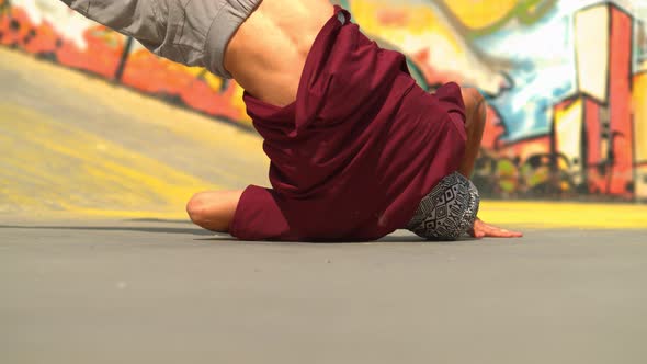 Close up of a man breakdancing  alt