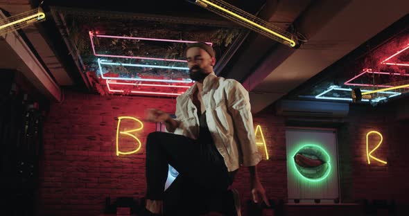 Amazing Dark Cafe with Color Lights , Young Men