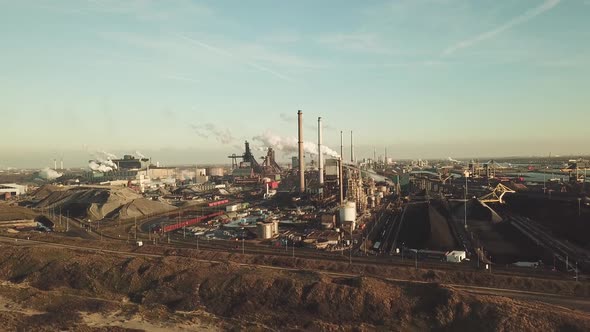 Aerial view of factory Tata Steel with smoking chimneys in Holland