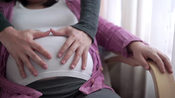 Pregnant Couple Feels Love and Relax at Home