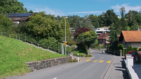 Empty Street in Alps Mountain Eschen City Liechtenstein Houses on the Sides