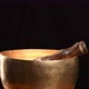 Copper singing bowl rotates around its axis - VideoHive Item for Sale