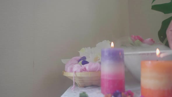 Spa massage and body treatment. Beautiful composition with candles and salt spa and