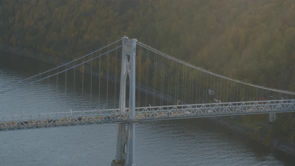 Aerial of vehicles riding on Mid-Hudson Bridge over Hudson river