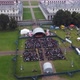 Drone View of a Performance Near Queen's House with a Large Number of People - VideoHive Item for Sale