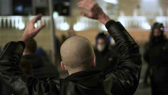 Fascist Skinhead Hooligan Provoking Police with Disturbing Presence
