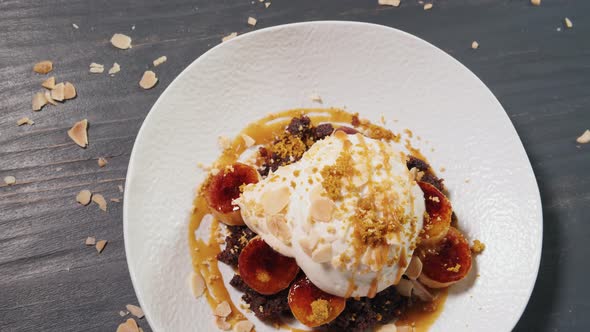 Young Beautiful Woman Eating a Dessert in Modern Restaurant High Kitchen Ice Cream Famous Chef