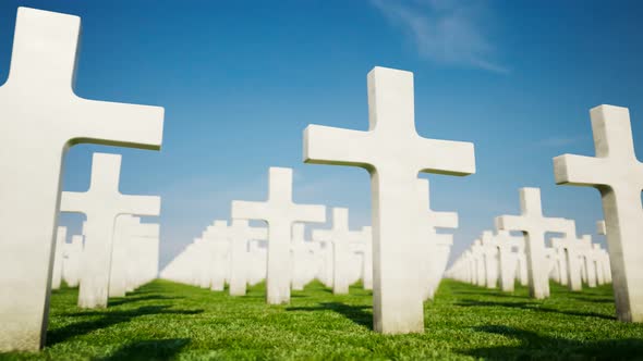 Churchyard. Endless view at the Christian crosses cemetery. Sunny day sky. 4k HD