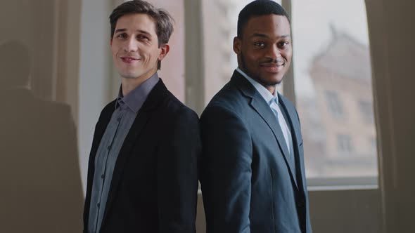 Two Male Multiethnic Partners Multiracial Colleagues Businessmen Caucasian Manager Boss and African