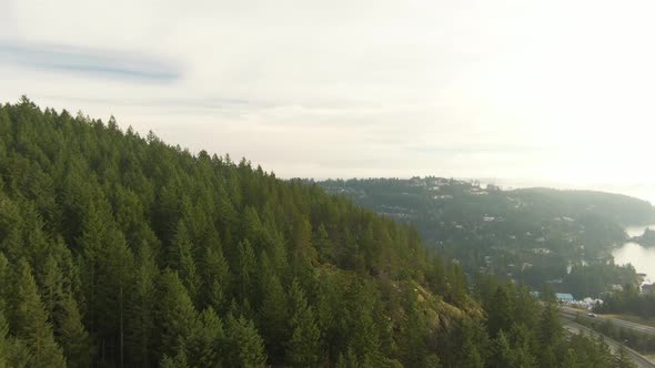 panoramic view of Sea to Sky Highway in Horseshoe Bay during a sunny winter sunset. Taken in West Va