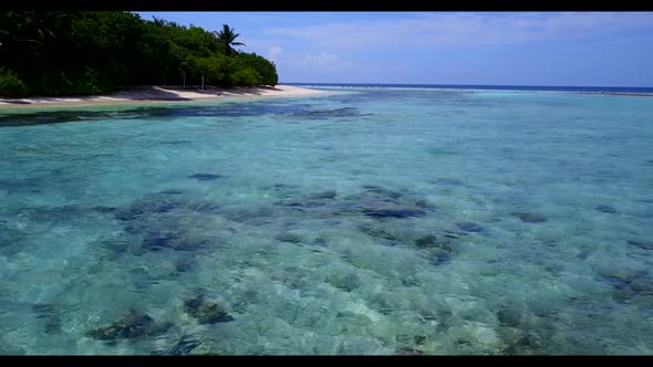 Aerial view abstract of relaxing tourist beach adventure by blue sea with white sand background of a