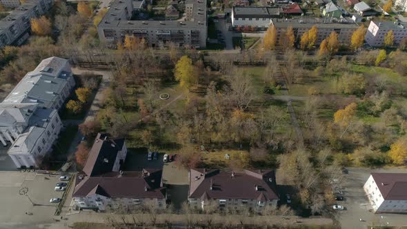 Aerial view of A park in provincial Russian city with five-story buildings. 50