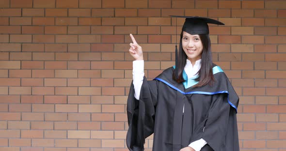 Happy woman get graduation in university