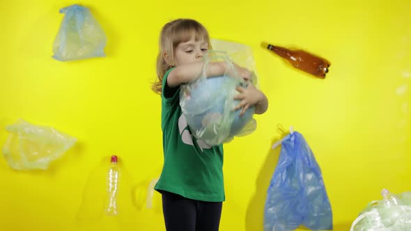 Girl Activist Makes Earth Globe Free From Plastic Package. Reduce Trash Pollution. Save Ecology