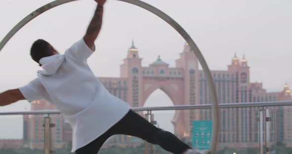 Spinning Moves in a Wheel Young Man is Doing Wheel Gymnastics Dubai UAE