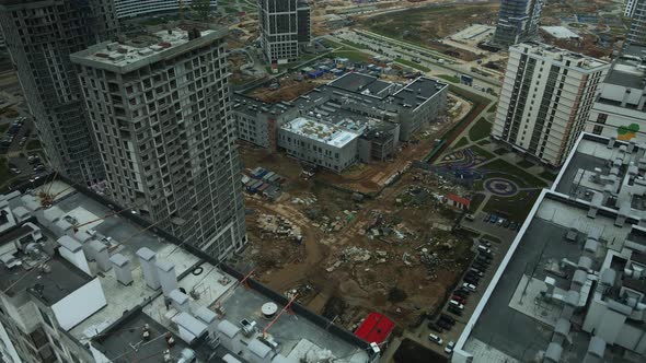 Construction of modern multi-storey buildings. Construction of a new city block.