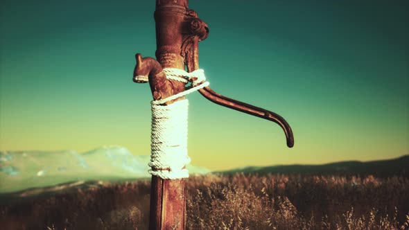 Old Hand Water Pump on Dry Hills