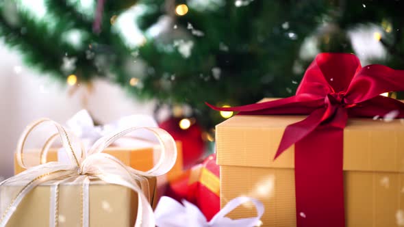 Pile of Gift Boxes Near Christmas Tree