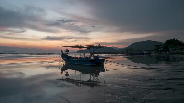 Timelapse view reflection of boat during low tide