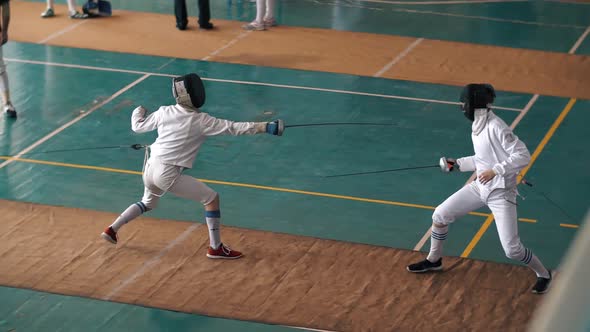 Duel of Two Fencers