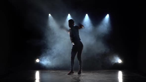 Young Man Dancing Breakdance in Studio