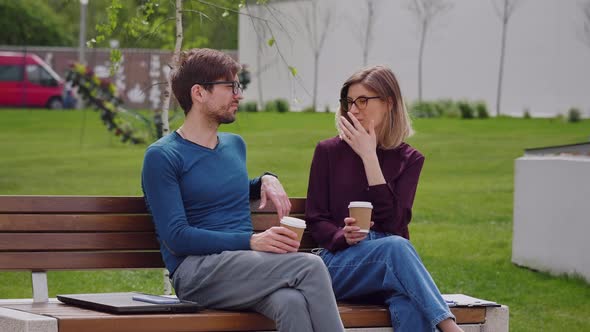 Two friends sipping coffee to-go Coffee Break work