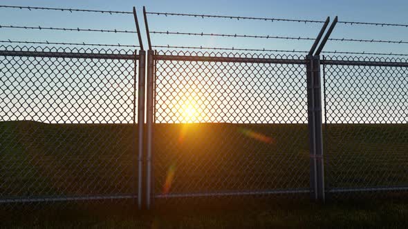 Boundary Fence With Sunset