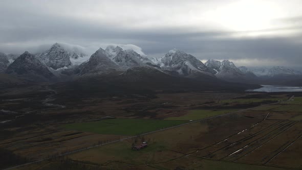 Surreal landscape of Northern Norway, scenic snowy Lyngen Alps, aerial