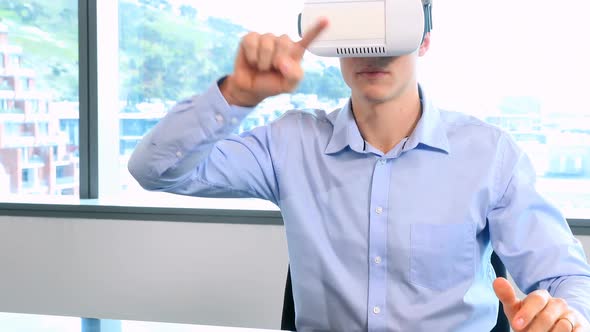 Male executive using virtual reality headset 4k