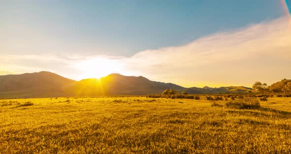 Mountain Meadow Timelapse at the Summer or Autumn Sunset Time