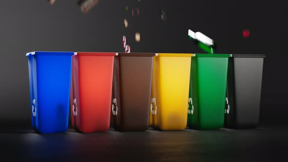 Colourful recycle trash bins in a dark background. Ecology at home. Eco-house.