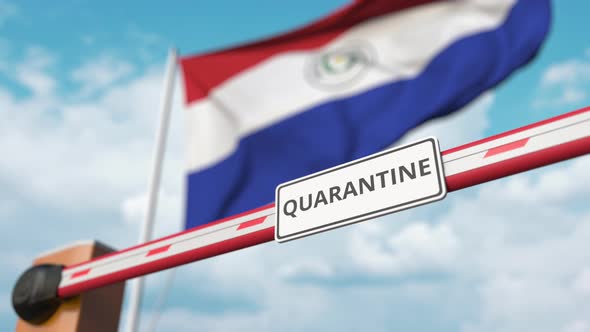 Barrier Gate with QUARANTINE Sign Open at Flag of Paraguay