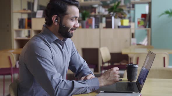 Indian Business Man Having Virtual Team Meeting on Video Conference Call