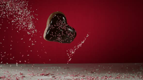 Doughnuts falling and bouncing in ultra slow mo 1500fps - reflective surface - DOUGHNUTS PHANTOM 