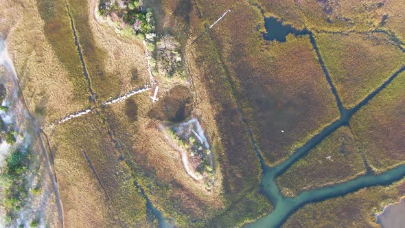 Bird's eye view of th estuary ecosystemn and mansions in Martha's Vineyard