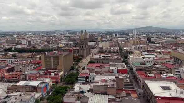 Big Buildings And Iconic Old Cathedral In Guadalajara Mexico - Aerial shot