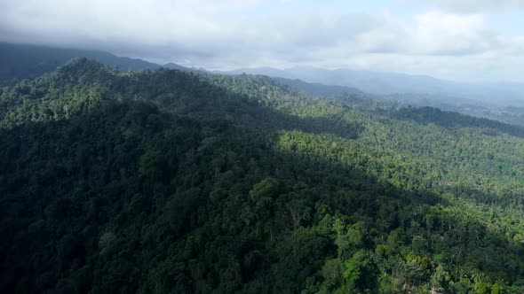 Drone Flying Near Mountains and Volcano