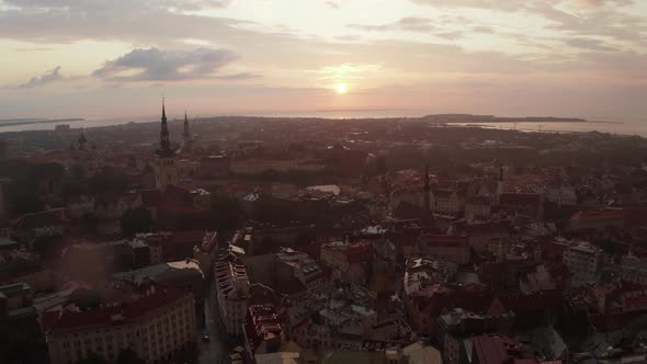 Beautiful Aerial Drone Shot of Old Town of Tallinn Estonia at Sunset