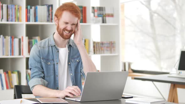 Headache Stressed Casual Redhead Man Working on Project