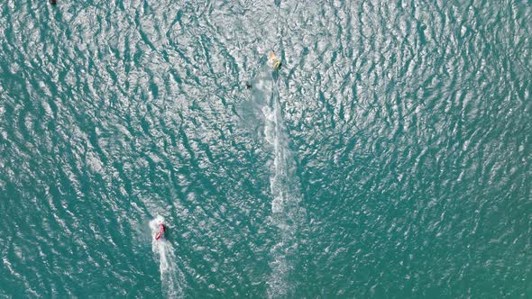 Aerial View of a Windsurfer Pulled Across the Water