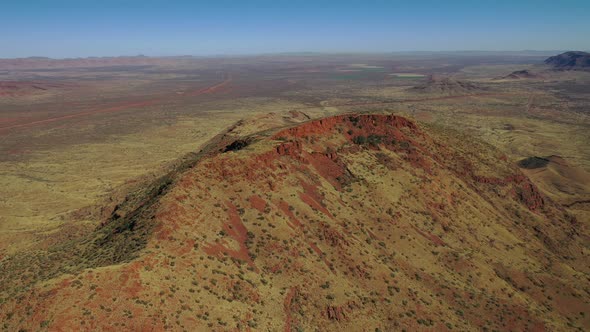 Summit of Mt Bruce, Karijini National Park, Western Australia Sunrise Sunset 4K Aerial Drone