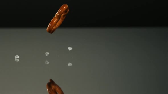 Pretzels falling and bouncing in ultra slow mo 