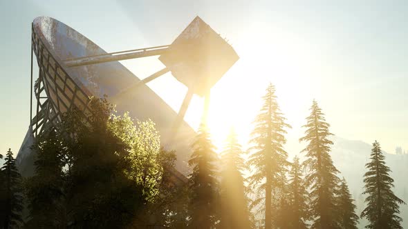 The Observatory Radio Telescope in Forest at Sunset alt