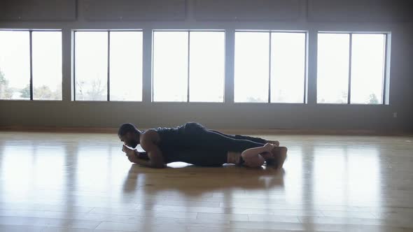 Partner Yoga performance done by two professional instructors