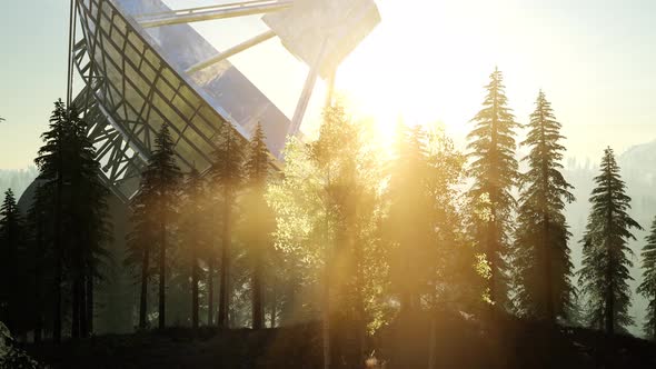 The Observatory Radio Telescope in Forest at Sunset