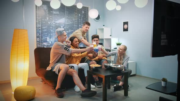 Happy Young People Cheers with Each Other with Dry Ice Cocktails