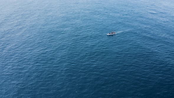 Aerial view of a motorboat in the ocean, Azores, Portugal.