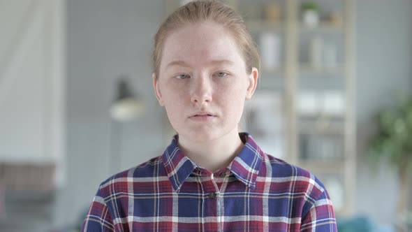 Close Up of Young Woman Coughing