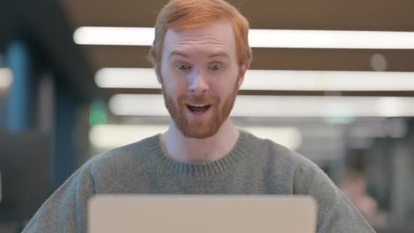 Portrait of Man Talking on Video Call on Laptop