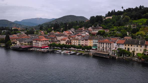 Drone Fly Along City on Seashore